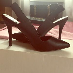 Black sling back pumps